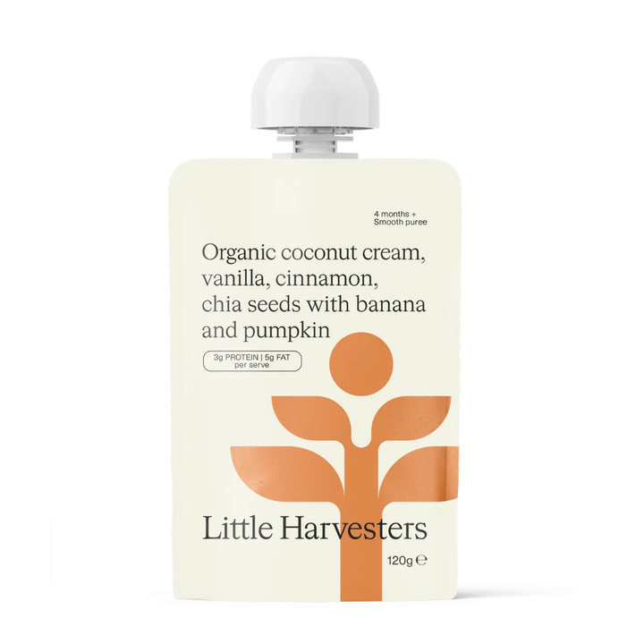 A 120g pouch of Little Harvesters Organic coconut cream, vanilla, cinnamon, chia seeds with banana and pumpkin puree, featuring a cream-colored body, an orange stylized tree logo, and a white cap on a white background.