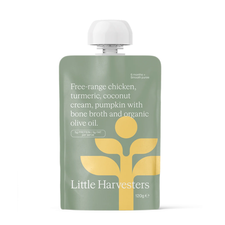 A 120g pouch of Little Harvesters baby food on a white background. The pouch is sage green with a yellow stylized leaf logo and white text detailing the ingredients: free-range chicken, turmeric, coconut cream, pumpkin, bone broth, and organic olive oil.